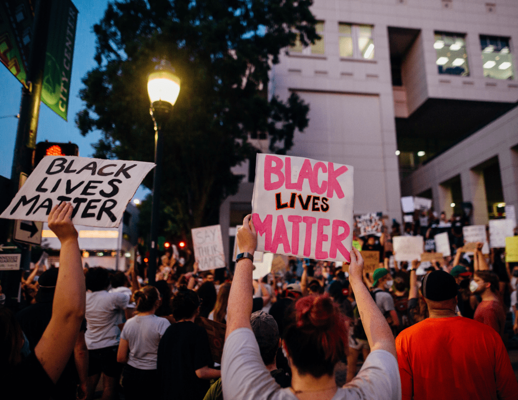 Black Lives Matter protest crowd holding signs